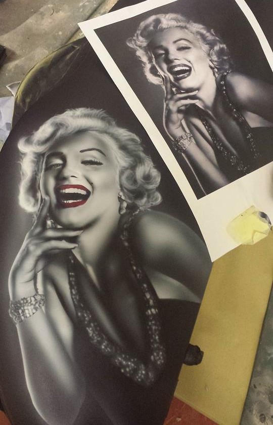 Airbrushed Painting of a Guitar Case with a Marilyn Monroe image with original reference photo
